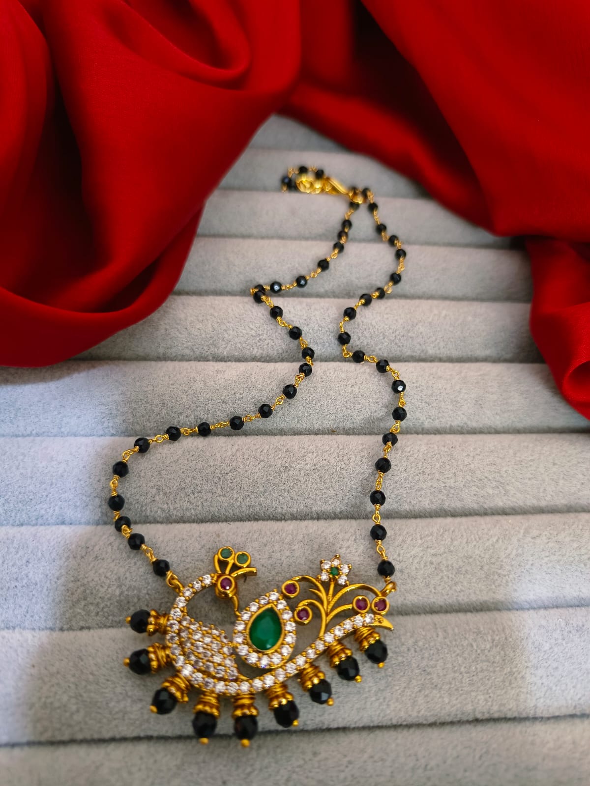 Peacock blackbeads